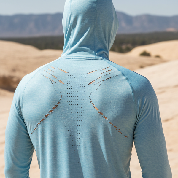 Close-up of AEROTREK fabric on a man's back, showing laser-cut ventilation and moisture evaporation under direct sun.